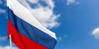 Гигантским триколором поздравили с Днем флага пассажиров аэропорта Шереметьево - Regions.Ru